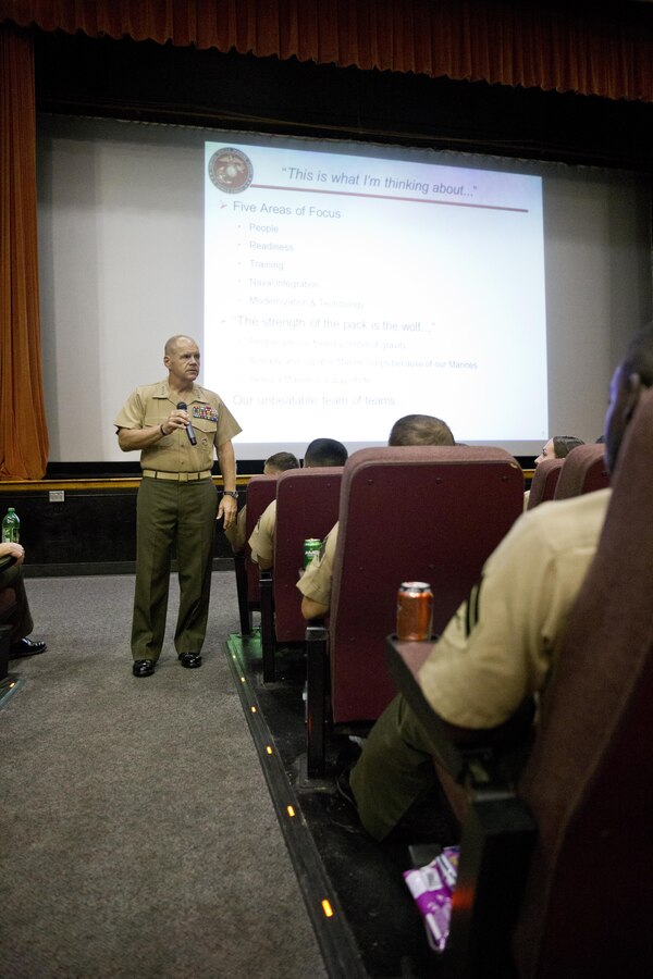 Commandant of the Marine Corps, Gen. Robert B. Neller, left, speaks to Marines at Marine Corps Air Station Beaufort, S.C., Oct. 16, 2015. Neller outlined the Corps' current priorities, expectations, listened and answered questions during his visit. (U.S. Marine Corps photo by Sgt. Gabriela Garcia/Released)