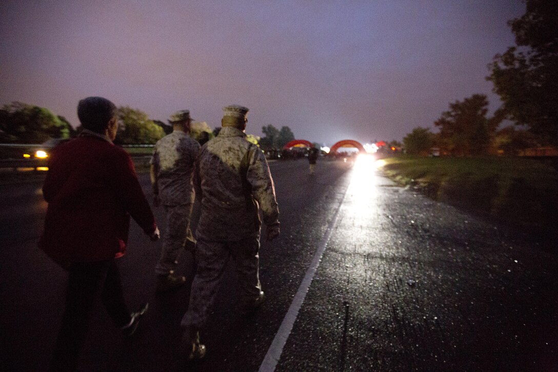 Commandant of the Marine Corps, Gen. Robert B. Neller, walks to the Marine Corps Marathon at Arlington, Va., Oct. 25, 2015. Over 30,000 runners participated in the 26.2 mile, 40th annual Marine Corps Marathon. (U.S. Marine Corps photo by Sgt. Gabriela Garcia/Released)