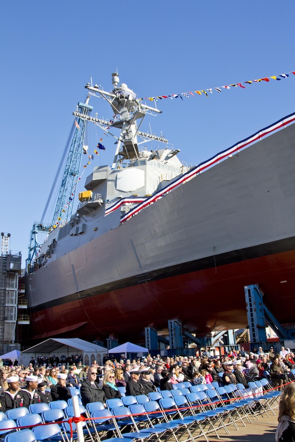 U.S. Marines, Sailors and guests attend the USS Rafael Peralta christening ceremony at General Dynamics Bath Iron Works, Bath, Maine, Oct. 31, 2015. The destroyer was named after Marine Corps Sgt. Rafael Peralta who was killed during the second battle of Fallujah in 2004. (U.S. Marine Corps photo Sgt. Gabriela Garcia/Released)