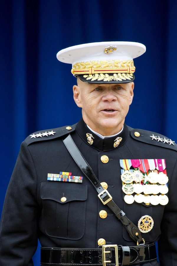 Commandant of the Marine Corps, Gen. Robert B. Neller, sings the Marines' hymn during the Pentagon cake cutting ceremony at Washington, D.C., Nov. 9, 2015. The ceremony celebrated the Corps' 240th birthday since it was first established on Nov. 10, 1775. (U.S. Marine Corps photo by Sgt. Gabriela Garcia/Released)