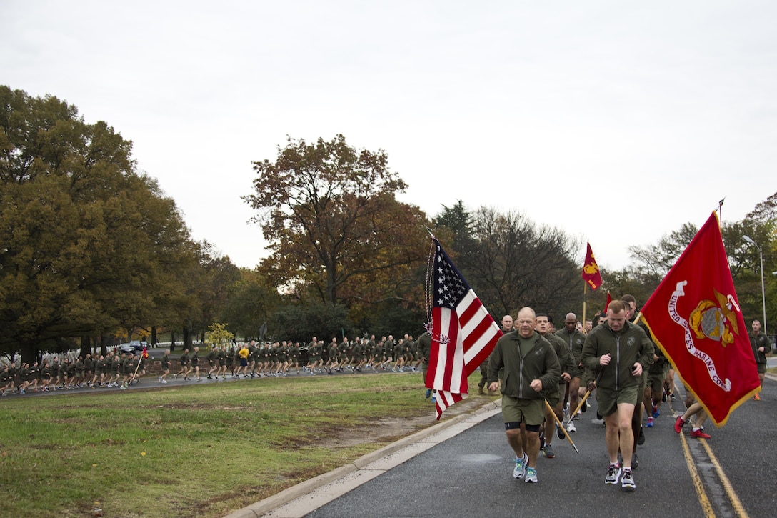 Commandant of the Marine Corps, Gen. Robert B. Neller, runs with Marines and Sailors at Arlington, Va., Nov. 12, 2015. Neller led Marines and Sailors on a Marine Corps birthday run from the Pentagon to the Marine Corps War Memorial. (U.S. Marine Corps photo by Staff Sgt. Gabriela Garcia/Released)