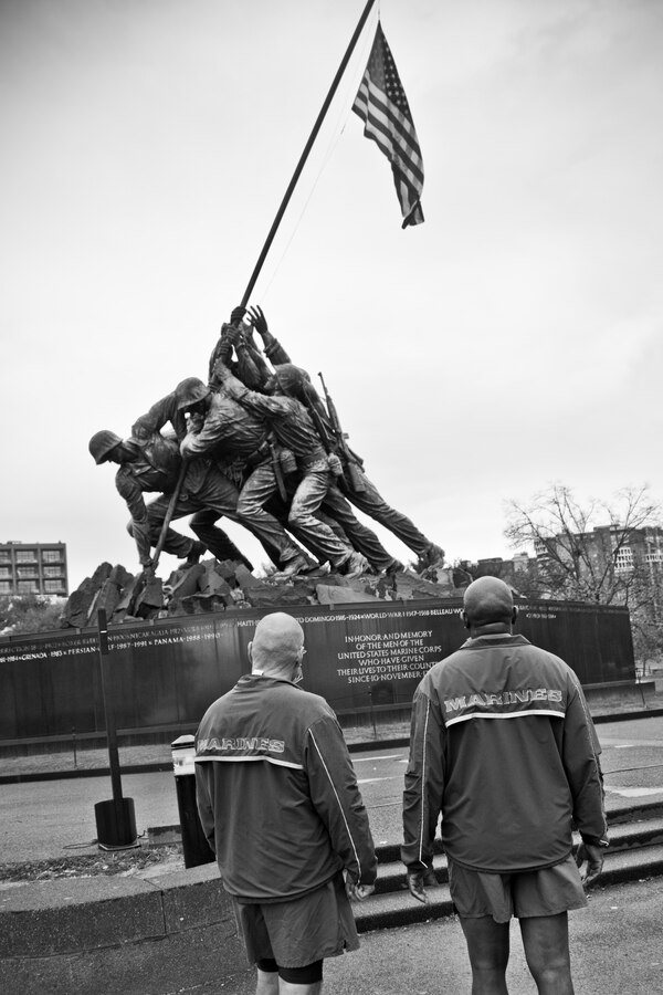 Commandant of the Marine Corps, Gen. Robert B. Neller, and Sgt. Maj. of the Marine Corps Ronald L. Green look at the Marine Corps War Memorial at Arlington, Va., Nov. 12, 2015. Neller and Green led Marines and Sailors on a Marine Corps birthday run from the Pentagon to the Marine Corps War Memorial. (U.S. Marine Corps photo by Staff Sgt. Gabriela Garcia/Released)