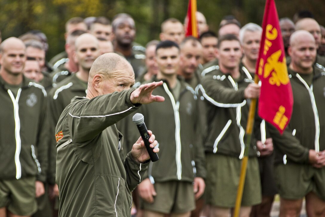 Commandant of the Marine Corps, Gen. Robert B. Neller, speaks to Marines and Sailors at Arlington, Va., Nov. 12, 2015. Neller led Marines and Sailors on a Marine Corps birthday run from the Pentagon to the Marine Corps War Memorial. (U.S. Marine Corps photo by Staff Sgt. Gabriela Garcia/Released)