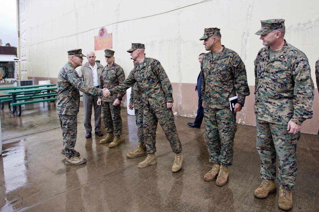 Commandant of the Marine Corps, Gen. Robert B. Neller, greets Marines at Marine Corps Base, Hawaii, Nov. 20, 2015. Neller outlined the Corps current priorities, expectations, listened and answered Marines' questions during his Hawaii visit. (U.S. Marine Corps photo by Staff Sgt. Gabriela Garcia/Released)