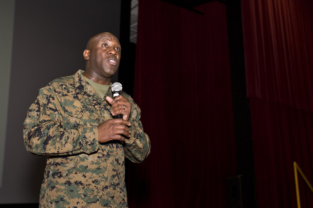 Sgt. Maj. of the Marine Corps Ronald L. Green speaks to Marines at Marine Corps Base, Hawaii, Nov. 20, 2015. Green and Commandant of the Marine Corps, Gen. Robert B. Neller outlined the Corps current priorities, expectations, listened and answered Marines' questions during their Hawaii visit. (U.S. Marine Corps photo by Staff Sgt. Gabriela Garcia/Released)