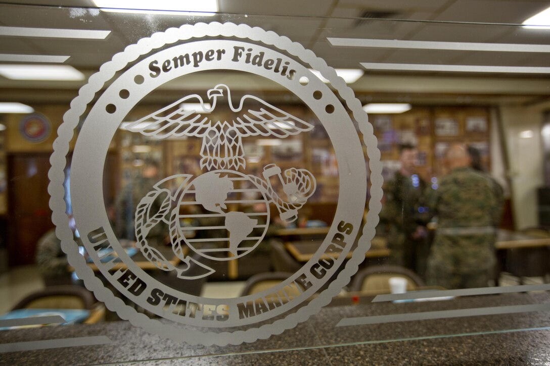 Commandant of the Marine Corps, Gen. Robert B. Neller, talks with Marines inside the mess hall at Marine Corps Base, Hawaii, Nov. 20, 2015. Neller visited with Marines to outline the Corps current priorities, expectations. (U.S. Marine Corps photo by Staff Sgt. Gabriela Garcia/Released)