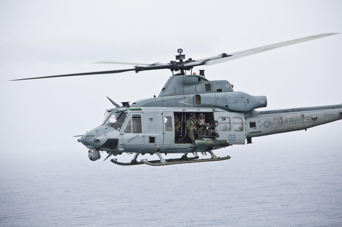 A UH-1Y huey aircraft with Marine Light Attack Helicopter Squadron 367, flies over Hawaii, Nov. 20, 2015. The unit gave Commandant of the Marine Corps, Gen. Robert B. Neller, and Sgt. Maj. of the Marine Corps Ronald L. Green, a tour of the Oahu facilities during their Hawaii visit. (U.S. Marine Corps photo by Staff Sgt. Gabriela Garcia/Released)