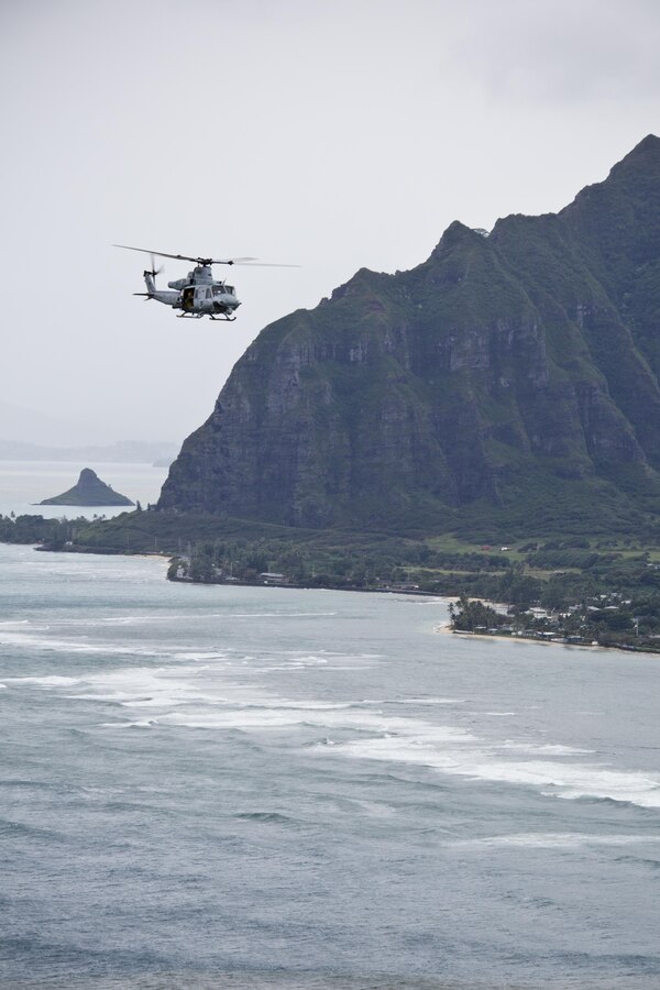 A UH-1Y huey aircraft with Marine Light Attack Helicopter Squadron 367, flies over Hawaii, Nov. 20, 2015. The unit gave Commandant of the Marine Corps, Gen. Robert B. Neller, and Sgt. Maj. of the Marine Corps Ronald L. Green, a tour of the Oahu facilities during their Hawaii visit. (U.S. Marine Corps photo by Staff Sgt. Gabriela Garcia/Released)