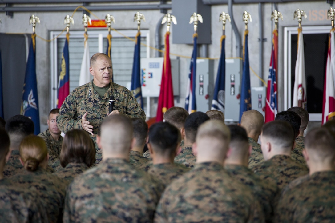 Commandant of the Marine Corps, Gen. Robert B. Neller, speaks with Marines at Marine Corps Air Station Futenma, Okinawa, Japan, Nov. 23, 2015. Neller visited with Marines to outline the Corps' current priorities, expectations, and answer Marines' questions. (U.S. Marine Corps photo by Staff Sgt. Gabriela Garcia/Released)