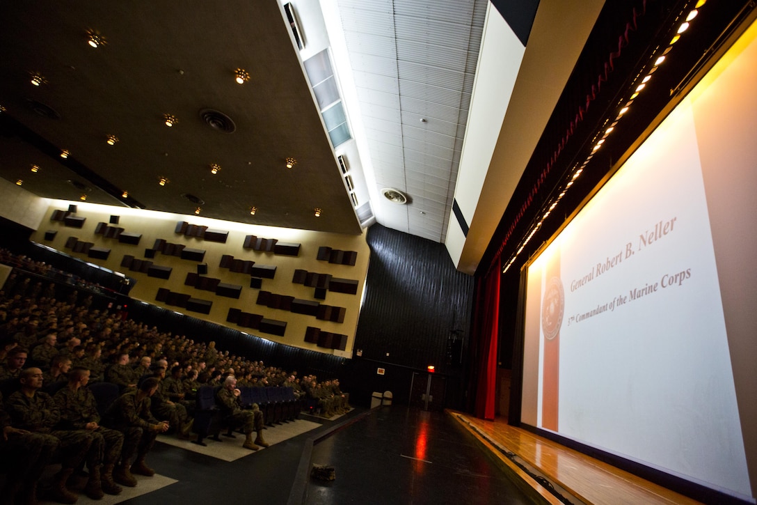 Commandant of the Marine Corps, Gen. Robert B. Neller speaks with Marines at Marine Corps Air Station Iwakuni, Okinawa, Japan, Nov. 24, 2015. Neller and Sgt. Maj. of the Marine Corps Ronald L. Green visited Marines to outline the Corps' current priorities, expectations, and answer questions. (U.S. Marine Corps photo by Staff Sgt. Gabriela Garcia/Released)