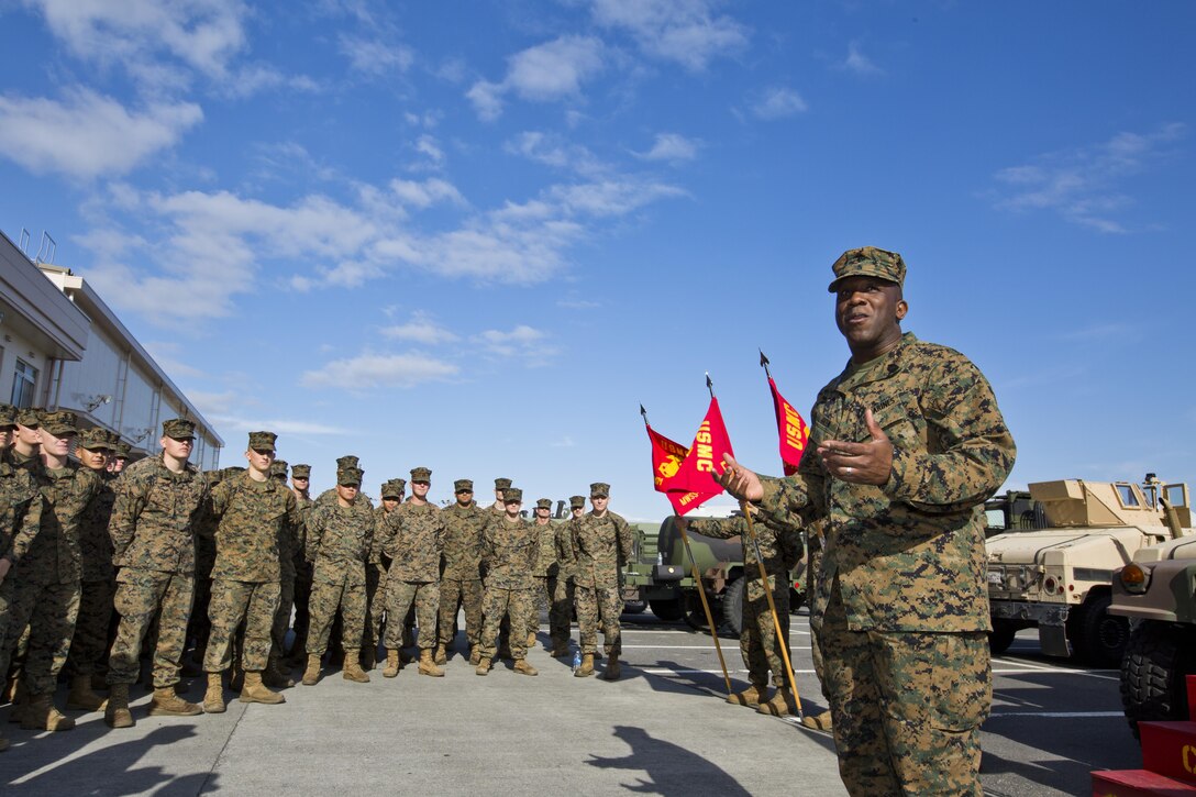 Sgt. Maj. of the Marine Corps Ronald L. Green speaks with Marines at Marine Corps Air Station Iwakuni, Okinawa, Japan, Nov. 24, 2015. Commandant of the Marine Corps, Gen. Robert B. Neller, and Green visited Marines to outline the Corps' current priorities, expectations, and answer questions. (U.S. Marine Corps photo by Staff Sgt. Gabriela Garcia/Released)