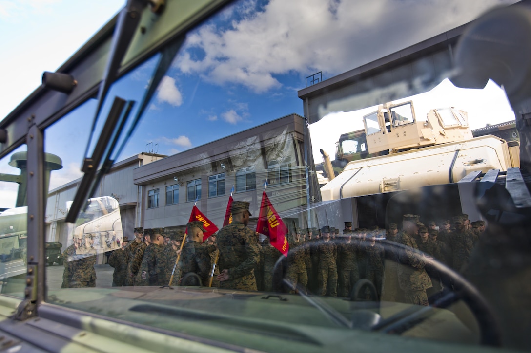 Commandant of the Marine Corps, Gen. Robert B. Neller speaks with Marines at Marine Corps Air Station Iwakuni, Okinawa, Japan, Nov. 24, 2015. Neller and Sgt. Maj. of the Marine Corps Ronald L. Green visited Marines to outline the Corps' current priorities, expectations, and answer questions. (U.S. Marine Corps photo by Staff Sgt. Gabriela Garcia/Released)