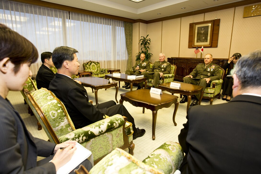 Commandant of the Marine Corps, Gen. Robert B. Neller, right, meets with Japan Admiral Tomohisa Takei, second left, the Japan Maritime Self-Defense Force chief of staff, at Tokyo, Japan, Nov. 25, 2015. Neller met with Takei and other Japanese defense officials during his Japan visit. (U.S. Marine Corps photo by Staff Sgt. Gabriela Garcia/Released)