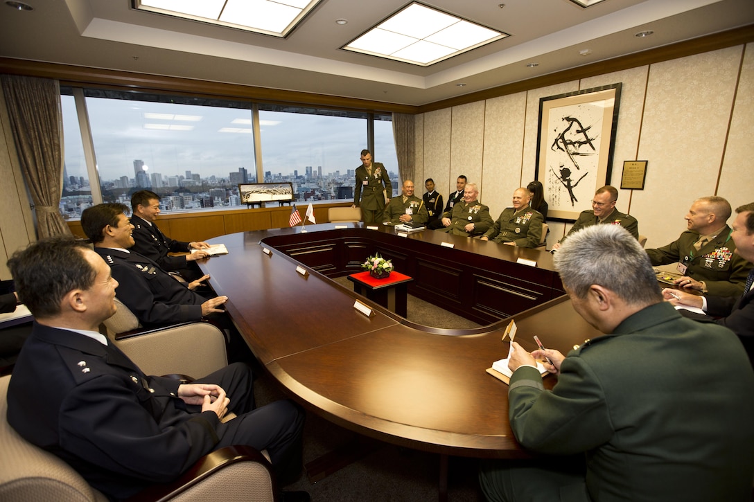 Commandant of the Marine Corps, Gen. Robert B. Neller, center right, meets with Japan General Harukazu Saitō, center left, chief of the Japan Air Self-Defense Force, at Tokyo, Japan, Nov. 25, 2015. Neller met with Saitō and other Japanese defense officials during his Japan visit. (U.S. Marine Corps photo by Staff Sgt. Gabriela Garcia/Released)