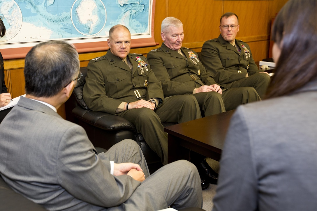 Commandant of the Marine Corps, Gen. Robert B. Neller, center, meets with Gen. Kiyohumi Iwata, right, the Japan Ground Self-Defense Force chief of staff, at Tokyo, Japan, Nov. 25, 2015. Neller met with Iwata and other Japanese defense officials during his Japan visit. (U.S. Marine Corps photo by Staff Sgt. Gabriela Garcia/Released)