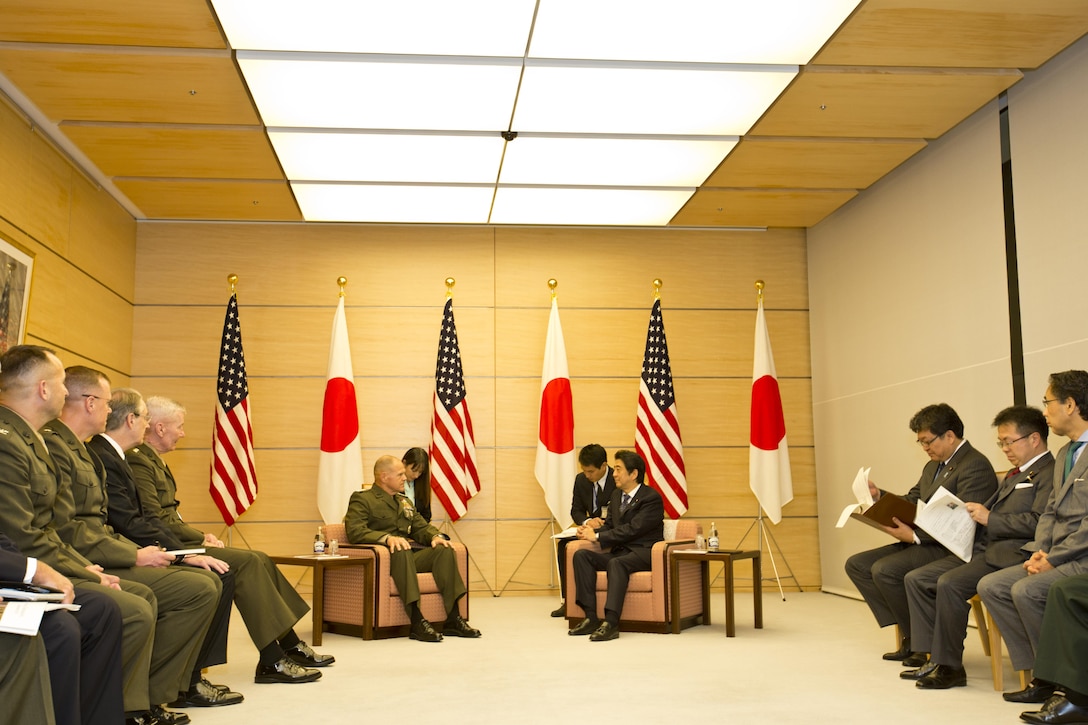 Commandant of the Marine Corps, Gen. Robert B. Neller, center left, meets with Shinzō Abe, the Prime Minister of Japan, center right, at Tokyo, Japan, Nov. 25, 2015. Neller met with Abe and other Japanese defense officials during his Japan visit. (U.S. Marine Corps photo by Staff Sgt. Gabriela Garcia/Released)