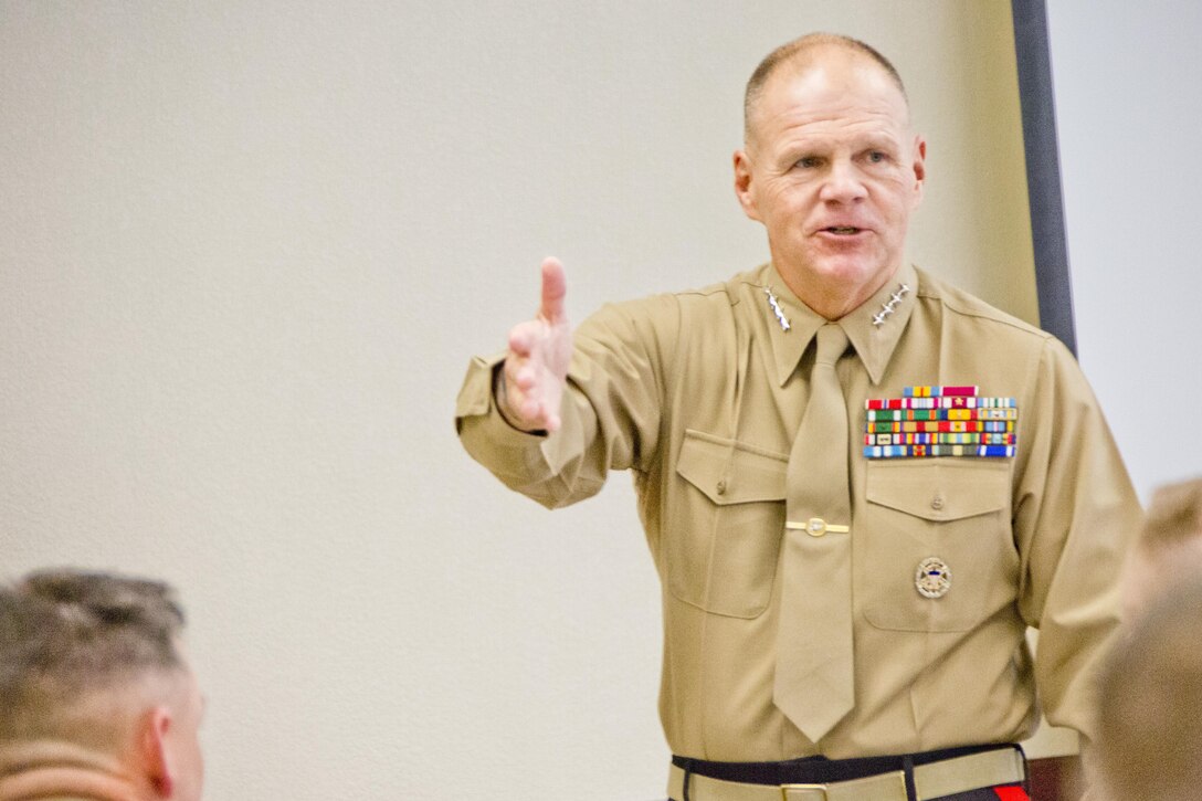 Commandant of the Marine Corps, Gen. Robert B. Neller speaks to Marines after a ceremony at Point Loma, Calif., Dec. 3, 2015. Neller was the guest of honor at the superior achiever ceremony for Marines of the Western and Eastern Recruiting Region. (U.S. Marine Corps photo by Staff Sgt. Gabriela Garcia/Released)