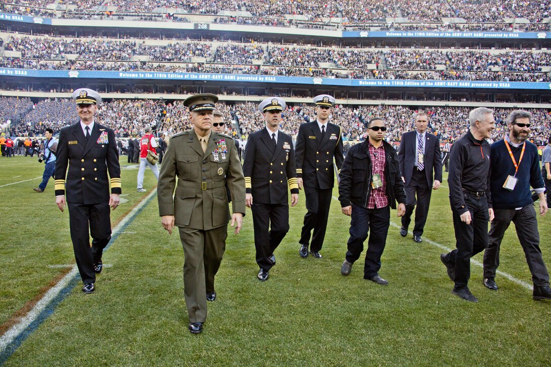 Commandant of the Marine Corps, Gen. Robert B. Neller attends the Army-Navy game at Lincoln Financial Field in Philadelphia, Pa., Dec. 12, 2015. Neller participated in the game's coin toss done by Secretary of Defense, Ashton B. Carter. (U.S. Marine Corps photo by Staff Sgt. Gabriela Garcia/Released)