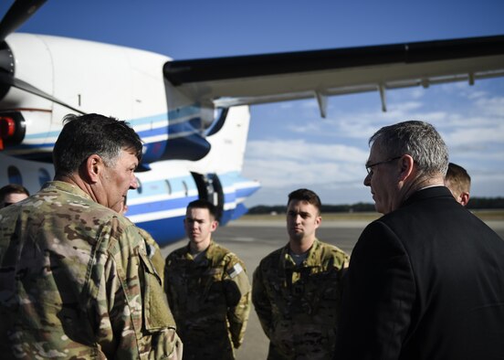 Deputy Secretary of Defense Bob Work speaks with Lt. Gen. Bradley Heithold, commander of Air Force Special Operations Command, during a static display of the C-146A Wolfhound and its crew at Hurlburt Field, Fla., Jan. 6, 2016. The deputy secretary of defense visited Hurlburt to talk with troops and speak to the leadership of AFSOC. (U.S. Air Force photo by Airman 1st Class Kai White)