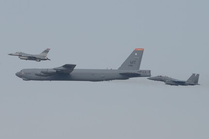 A United States Air Force B-52 Stratofortress from Andersen Air Base Guam,conducted a low-level flight in the vicinity of Osan, South Korea, in response to recent provocative action by North Korea Jan 10. The B-52 was joined by a ROK F-15K Slam Eagle and a U.S. F-16 Fighting Falcon. (U.S. Air Force photo by Airman 1st Class Dillian Bamman/Released)