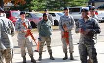 Airmen from the 459th Security Forces Squadron learn how to respond in an active shooter scenario during Expeditionary Active Shooter Training Nov. 7, 2015 at Joint Base Andrews, MD. The class is a new Air Force requirement for all deploying Airmen, as part of a new initiative to prepare Airmen for potential threats in deployed environments.  
