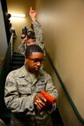 Senior Airman Martin Hawkins, 459th Security Forces Squadron member, practices approaching a live shooter during Expeditionary Active Shooter Training Nov. 7, 2015. The class, which began in October 2015, is a two-tier level training for all deploying Airmen. (U.S. Air Force photo by Chief Master Sgt. Dale Canofari) 