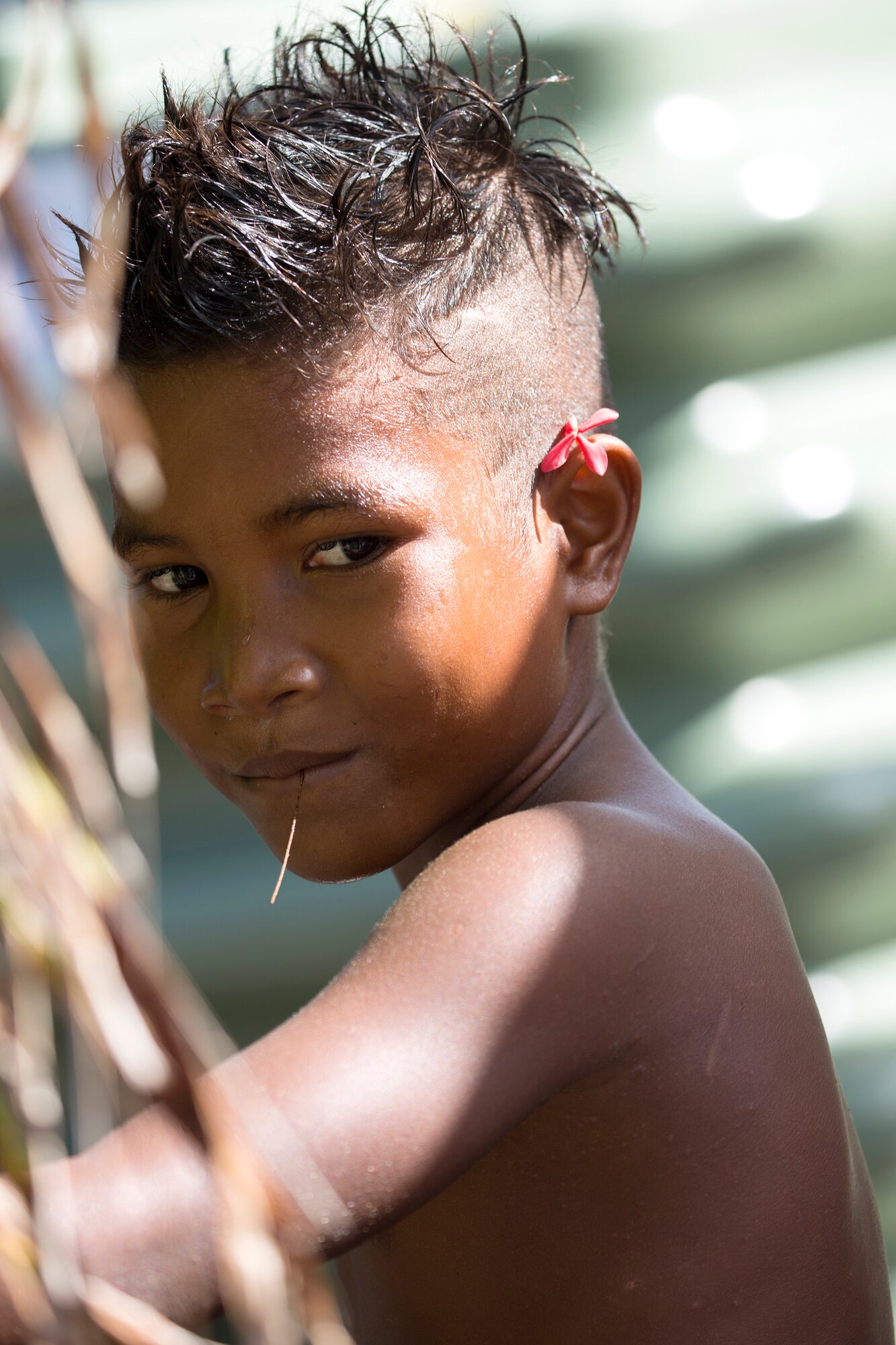 A child on Fais Island, Federated States of Micronesia, Dec. 8, 2015. A C-130 Hercules from the 36th Airlift Squadron delivered more than 800 pounds of supplies to Fais island during Operation Christmas Drop 2015. This year marks the first trilateral execution that includes air support from the Japan Air-Self Defense force and the Royal Australian Air Force. (U.S. Air Force photo by Osakabe Yasuo/Released) 