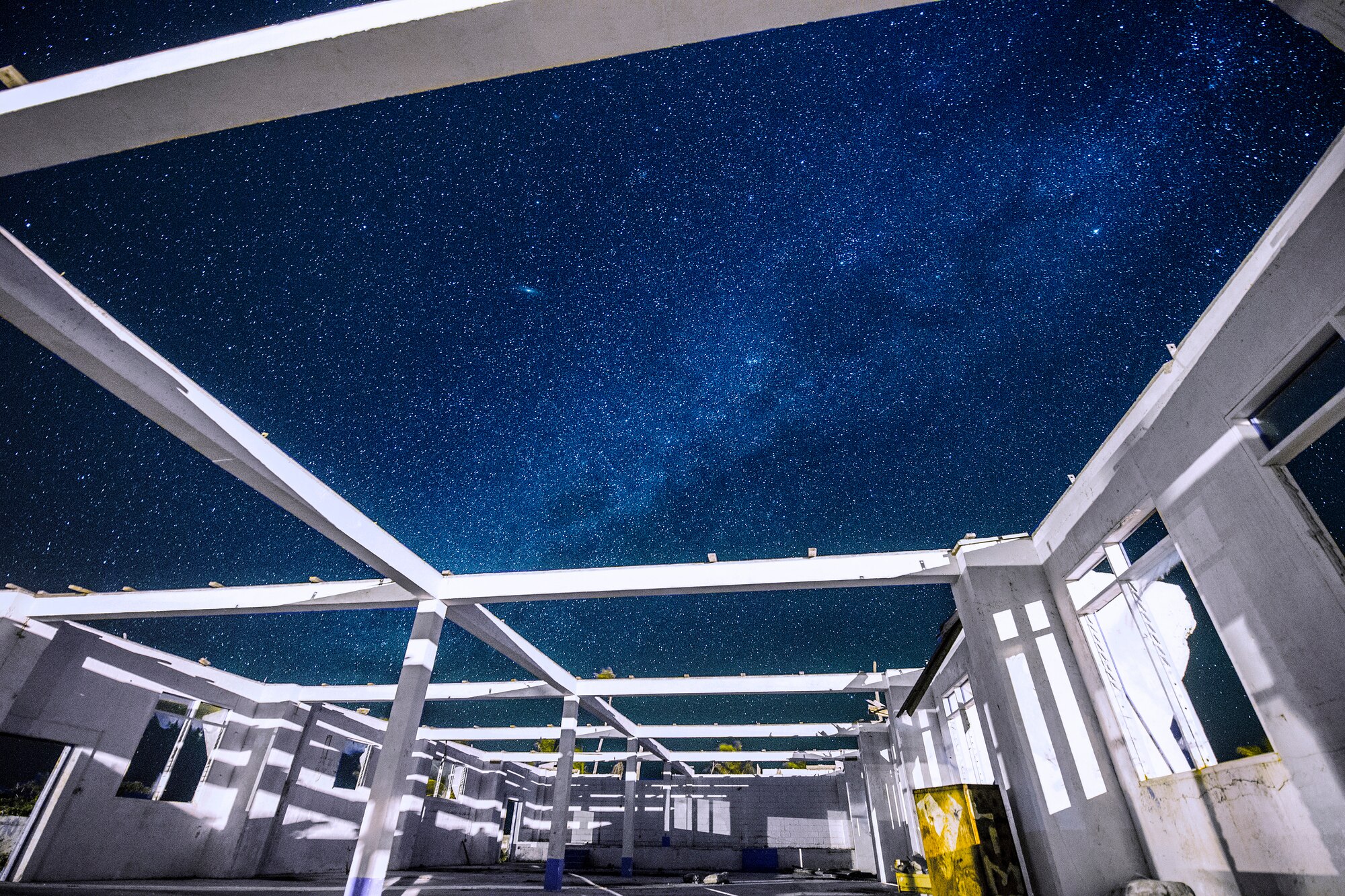 The Milky Way appears over a damaged school building hit by typhoon Maysak at Falalop Island, Ulithi Atoll, Federated States of Micronesia, Dec. 8, 2015. Category five typhoon Maysak caused severe damage to the islands of Yap and Chuuk and the Ulithi Atoll in the FSM this past March. (U.S. Air Force photo by Osakabe Yasuo/Released) 