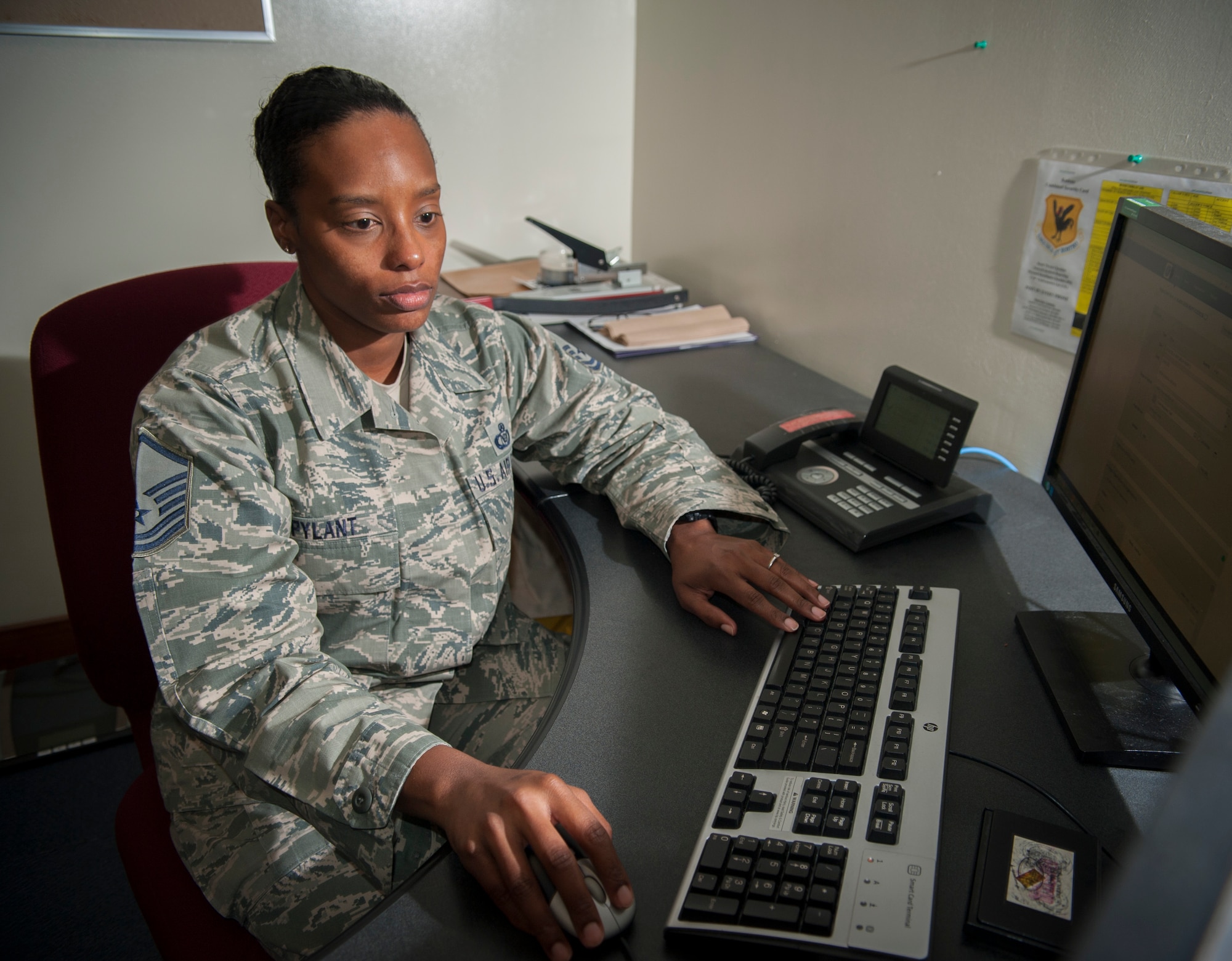 U.S. Air Force Master Sgt. DeAnna Pylant launches the AtHoc notification system Jan. 11, 2016, at Kadena Air Base, Japan. The AtHoc system is used for mass emergency notifications through email and text message. (U.S. Air Force photo by Master Sgt. Jason W. Edwards)