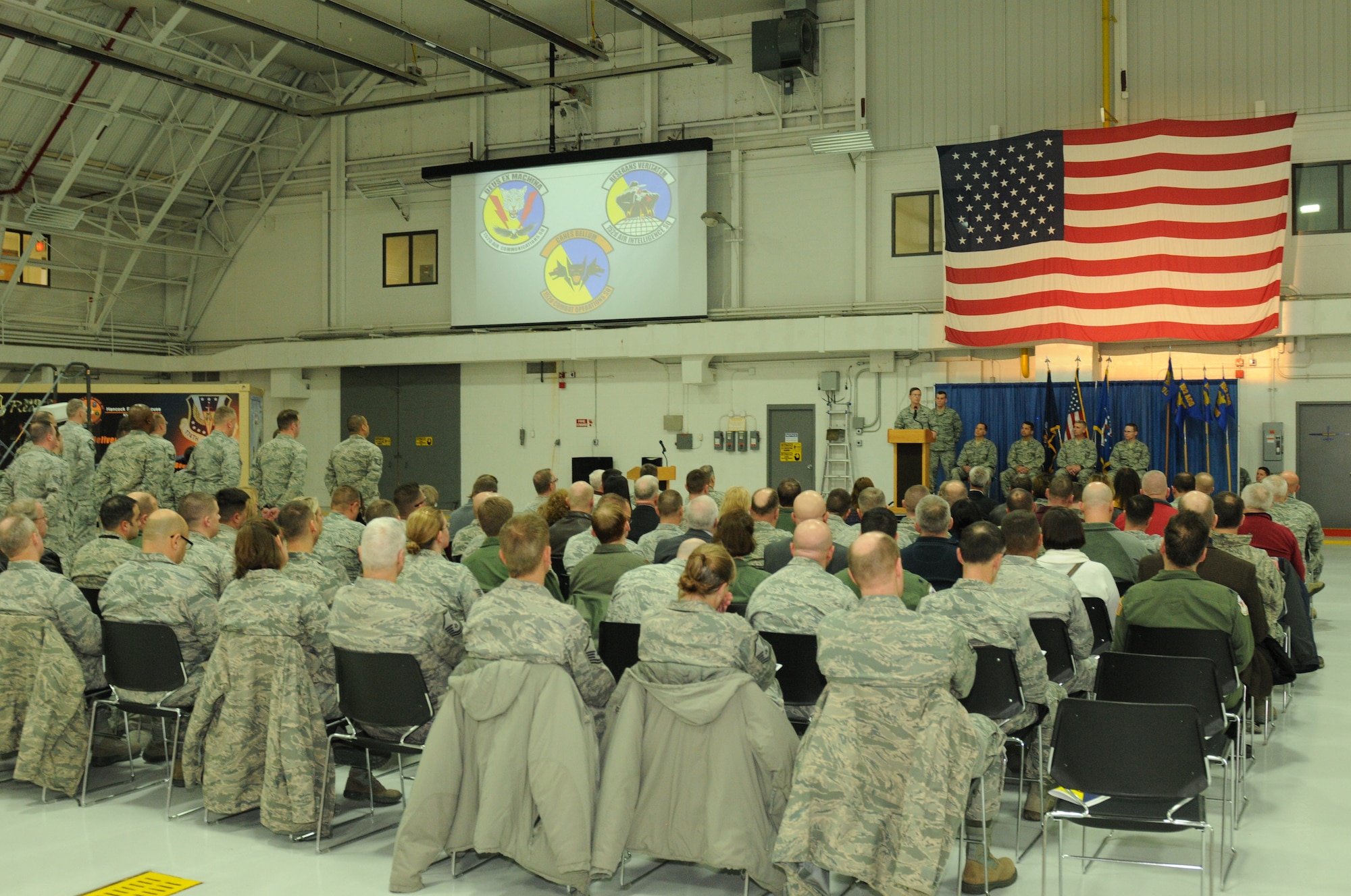 Col. Greg Semmel, commander of the 174th Attack Wing, speaks during the 152nd Air Operations Group squadron activation and assumption of command ceremony held at Hancock Field Air National Guard Base Jan. 9. (U.S. Air National Guard photo by Tech. Sgt. Justin Huett/Released)
