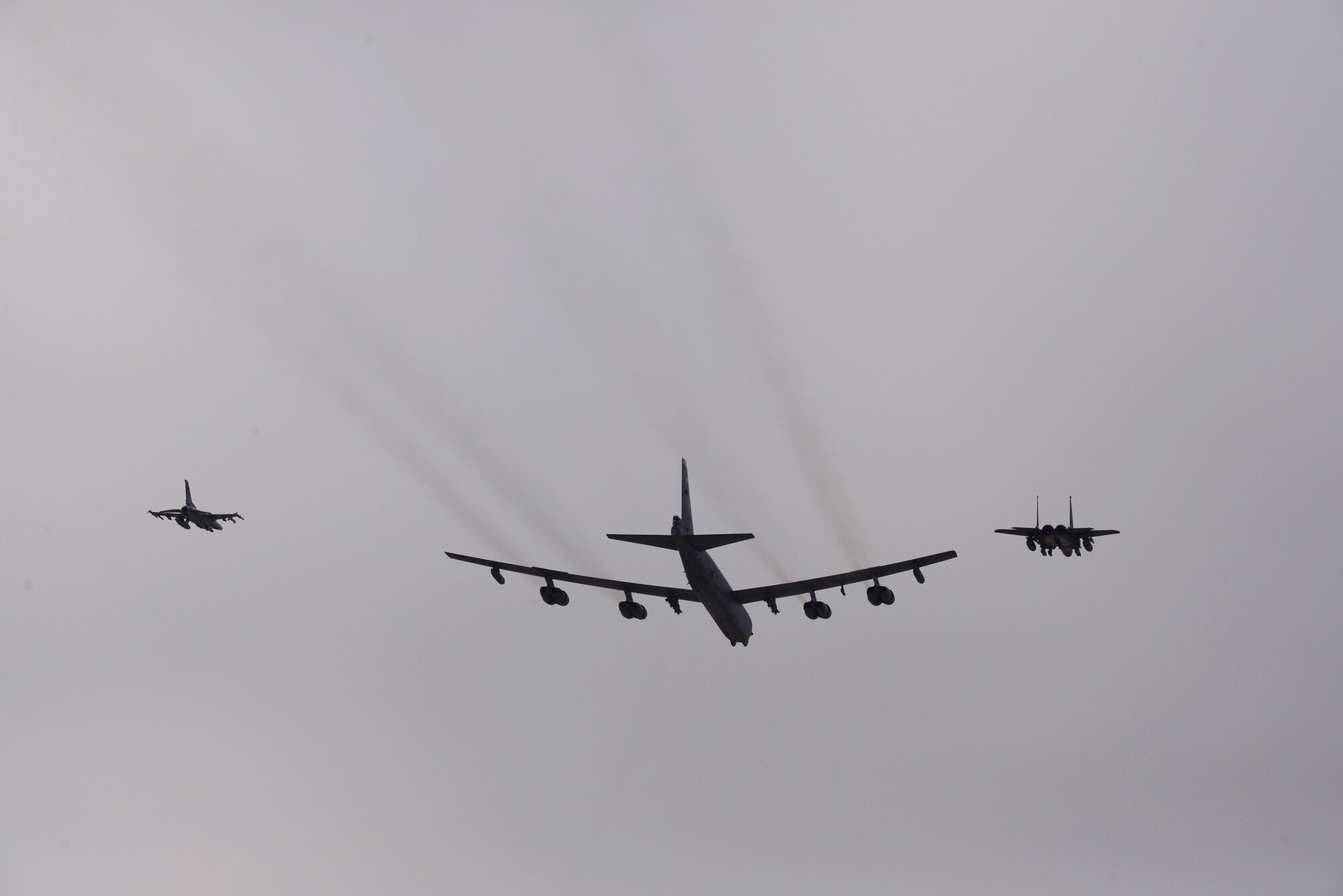 A U.S. Air Force B-52H  Stratofortress from Andersen Air Force Base, Guam, conducted a low-level flight in the vicinity of Osan, South Korea, in response to recent provocative action by North Korea Jan. 10, 2016. The B-52 was joined by a ROKAF F-15 Slam Eagle and a U.S. Air Force F-16 Fighting Falcon.  The B-52 is a is a long-range, heavy bomber that can fly up to 50,000 feet and has the capability to carry 70,000 pounds of nuclear or precision guided conventional ordnance with worldwide precision navigation capability. 
(U.S. Air Force photo/Staff Sgt. Amber Grimm)