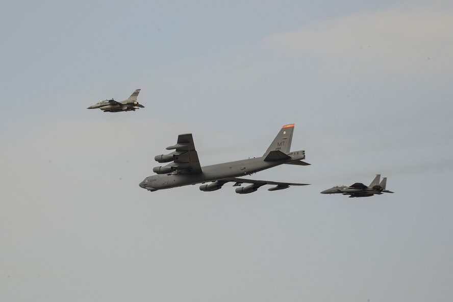 A U.S. Air Force B-52 Stratofortress from Andersen Air Force Base, Guam, conducted a low-level flight in the vicinity of Osan, South Korea, in response to recent provocative action by North Korea Jan 10, 2016. The B-52 was joined by a ROKAF F-15 Slam Eagle and a U.S. Air Force F-16 Fighting Falcon.  The B-52 is a is a long-range, heavy bomber that can fly up to 50,000 feet and has the capability to carry 70,000 pounds of nuclear or precision guided conventional ordnance with worldwide precision navigation capability. (U.S. Air Force photo/Senior Airman Kristin High)
