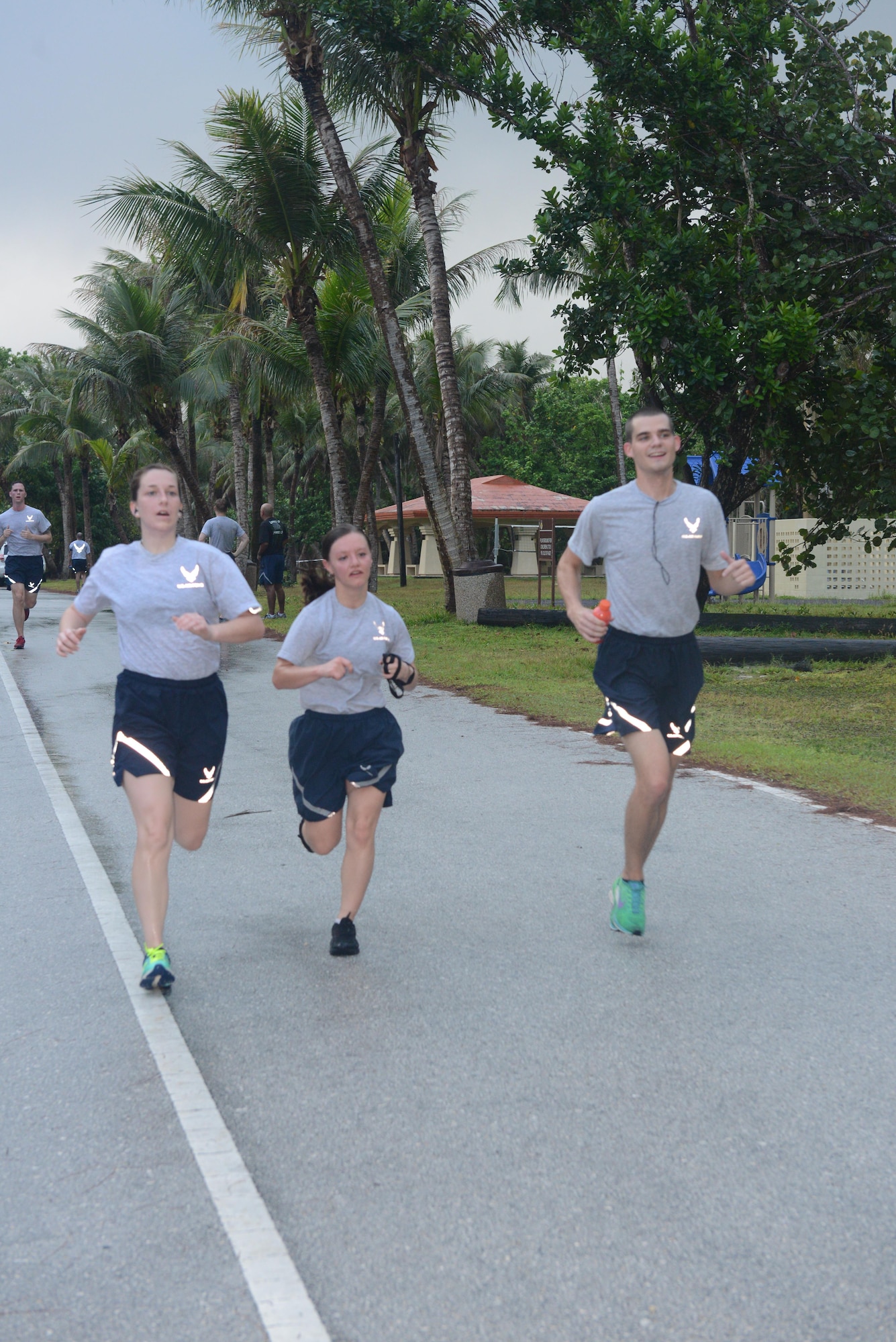 Airmen approach the finish line of the 6K memorial run Jan. 8, 2016, at Andersen Air Force Base, Guam. Service members ran six kilometers to represent the six Airmen who were killed Dec. 21, 2015, while conducting counter-threat operations outside of Bagram Air Base, Afghanistan. (U.S. Air Force photo/Airman 1st Class Arielle Vasquez)
