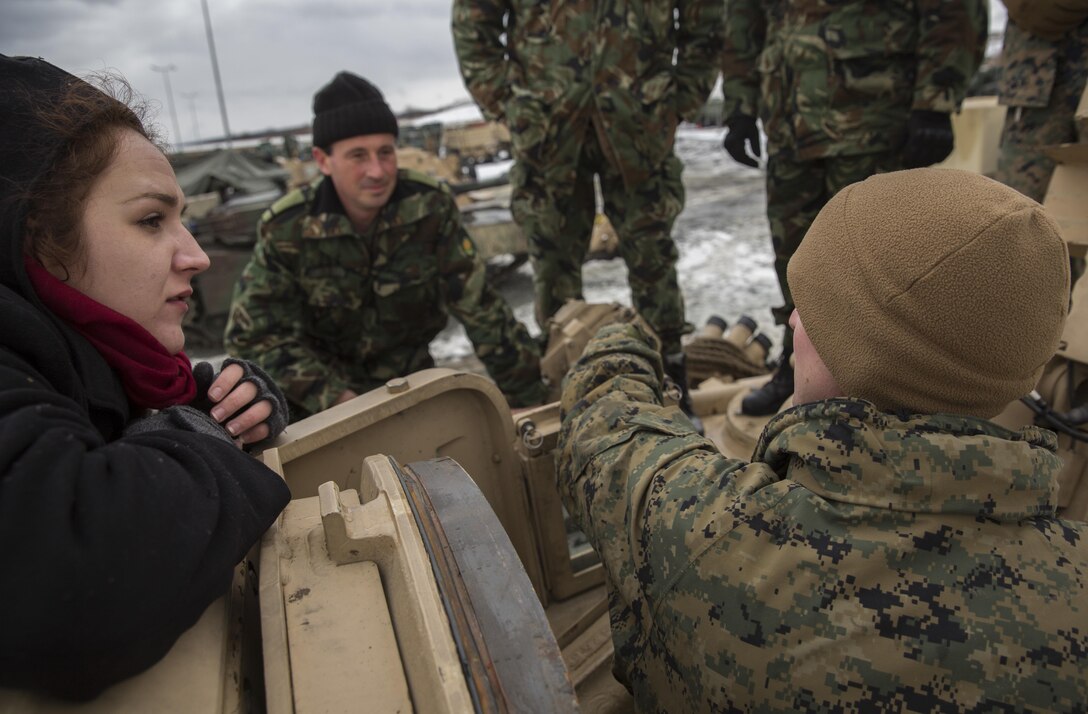 Marines with the Combined Arms Company, Black Sea Rotational Force, Bulgarian and Romanian Forces spent the afternoon getting hands on with the vehicles and weapons each country has brought to Platinum Lion 16.2 on Novo Selo Training Area, Bulgaria, Jan. 7, 2016. Platinum Lion is designed to increase collective capabilities and demonstrates our collective ability to operate as a single force committed to protecting the sovereignty of NATO allies and other European partners. (U.S. Marine Corps Photo by Cpl. Justin T. Updegraff/ Released)