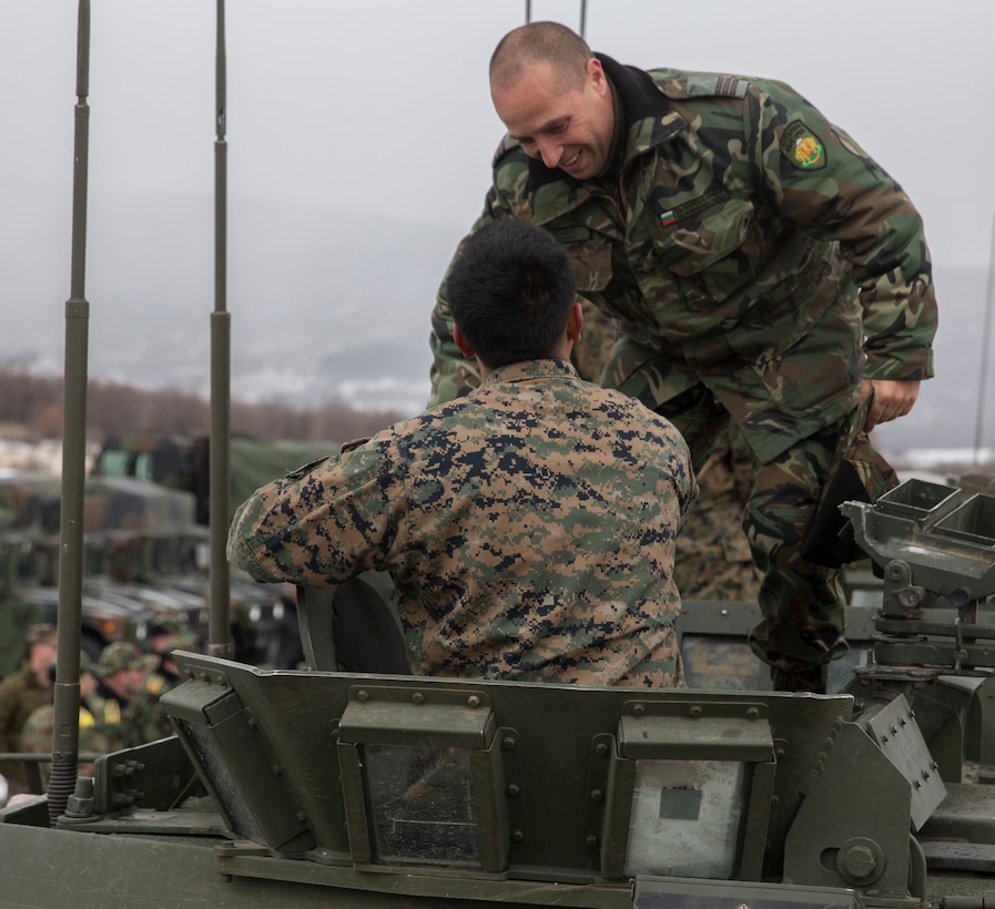 Marines with the Combined Arms Company, Black Sea Rotational Force, Bulgarian and Romanian Forces spent the afternoon getting hands on with the vehicles and weapons each country has brought to Platinum Lion 16.2 on Novo Selo Training Area, Bulgaria, Jan. 7, 2016. Platinum Lion is designed to increase collective capabilities and demonstrates our collective ability to operate as a single force committed to protecting the sovereignty of NATO allies and other European partners. (U.S. Marine Corps Photo by Cpl. Justin T. Updegraff/ Released)