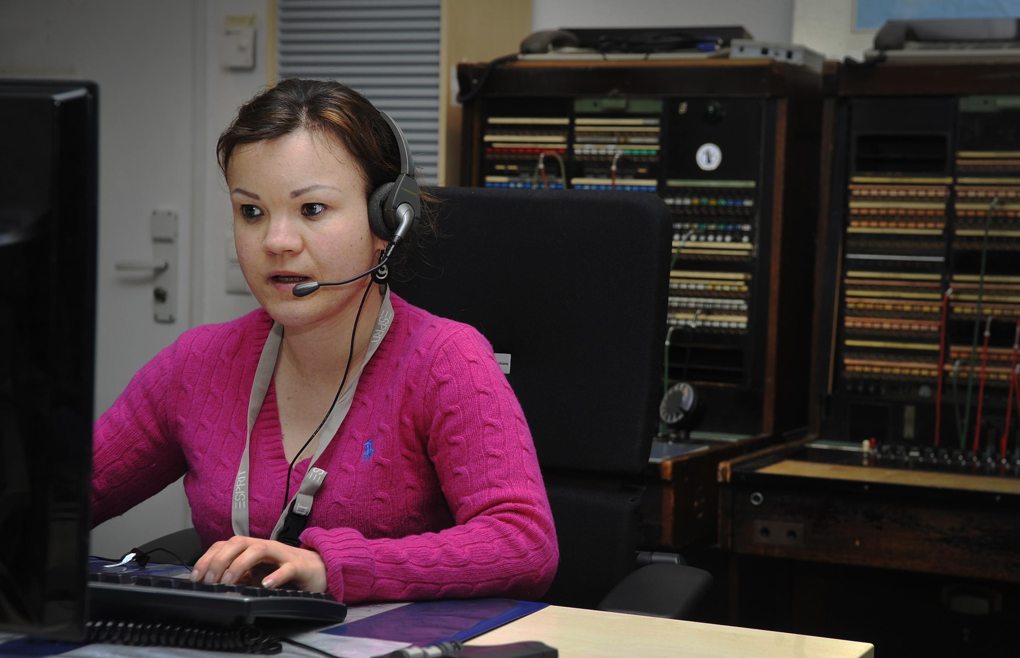 Verena Klein, a 86th Communications Squadron consolidated switchboard operator, transfers a caller to the appropriate organization Jan. 4, 2015, at Ramstein Air Base, Germany. The operators answer more than 1.5 million calls annually and service the Air Force, Army, Navy, Marines, and U.S. State Department personnel around the world. (U.S. Air Force photo/Airman 1st Class Larissa Greatwood)