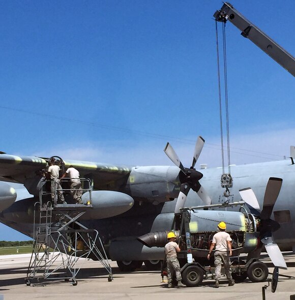 It’s all in a day’s work as maintainers from the 920th Aircraft Maintenance Squadron here replace an HC-130P/N King fixed wing aircraft engine to prepare it for its final flight Sept. 9, 2015. It and five more aircraft from Patrick AFB were flown into retirement at Davis-Monthan Air Force Base's 309th Aerospace Maintenance and Regeneration Group, the aircraft retirement "bone yard," in Arizona. For nearly 50 years, this combat-proven aircraft served the Air Force, providing more than 16,000 hours of superior air support for its Airmen in combat, special operations, humanitarian, aerial refueling, and search and rescue missions around the world. (Courtesy photo)
