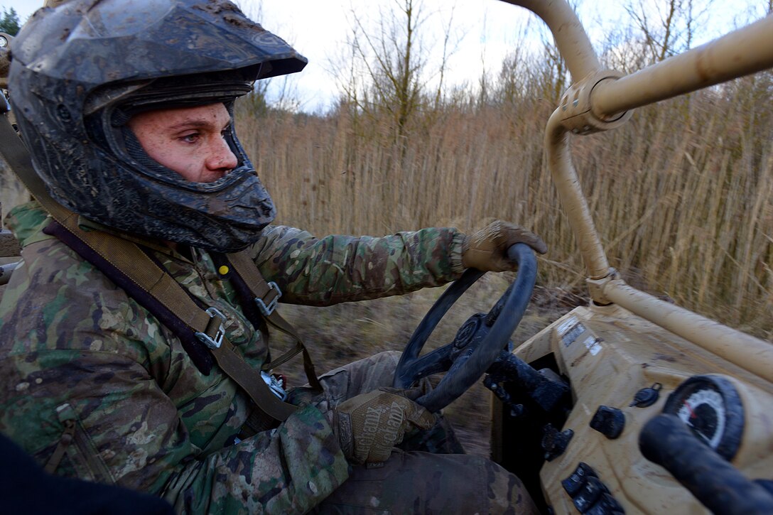 A U.S. soldier tests the capabilities of the MRZR4 LT-All Terrain Vehicle in the Boeblingen Local Training Area, Germany, Jan. 5, 2016. U.S. Army photo by Jason Johnston