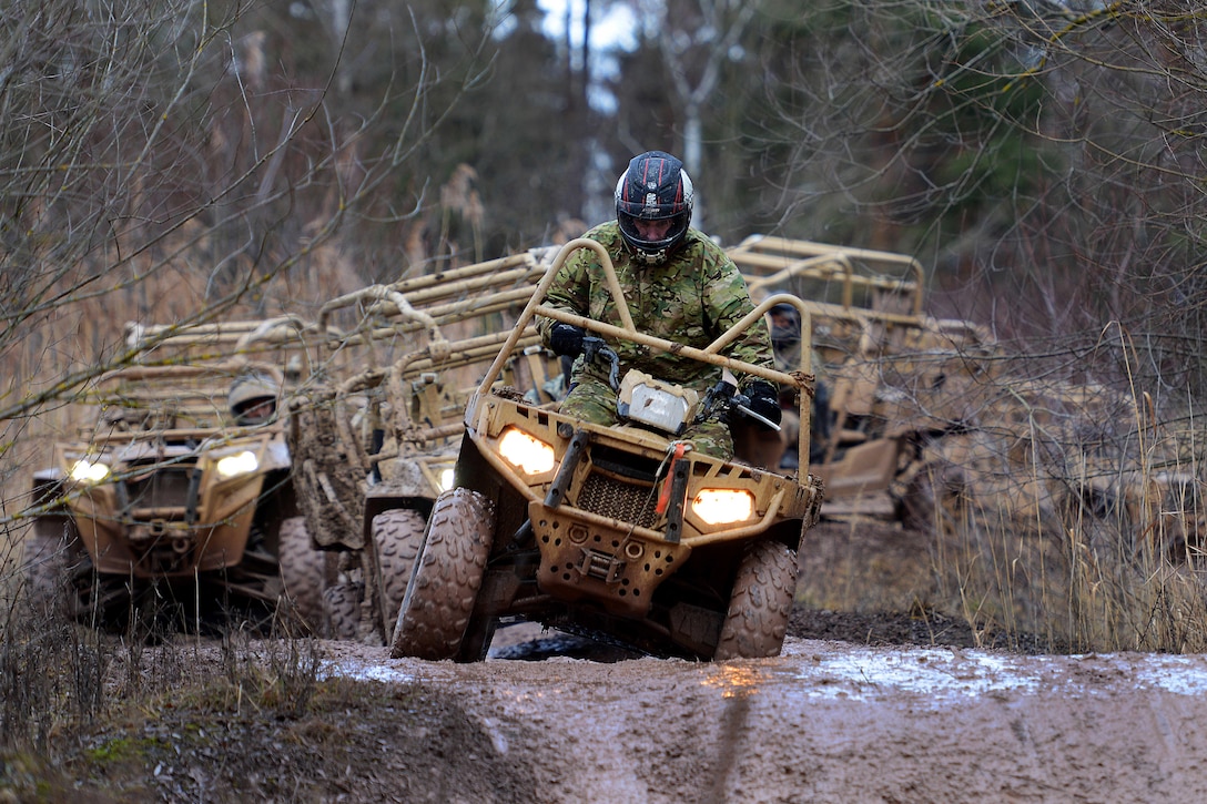 A U.S. soldier tests the capabilities of an MRZR4 LT all-terrain vehicle in the Boeblingen Local Training Area, Germany, Jan. 5, 2016. U.S. Army photo by Jason Johnston