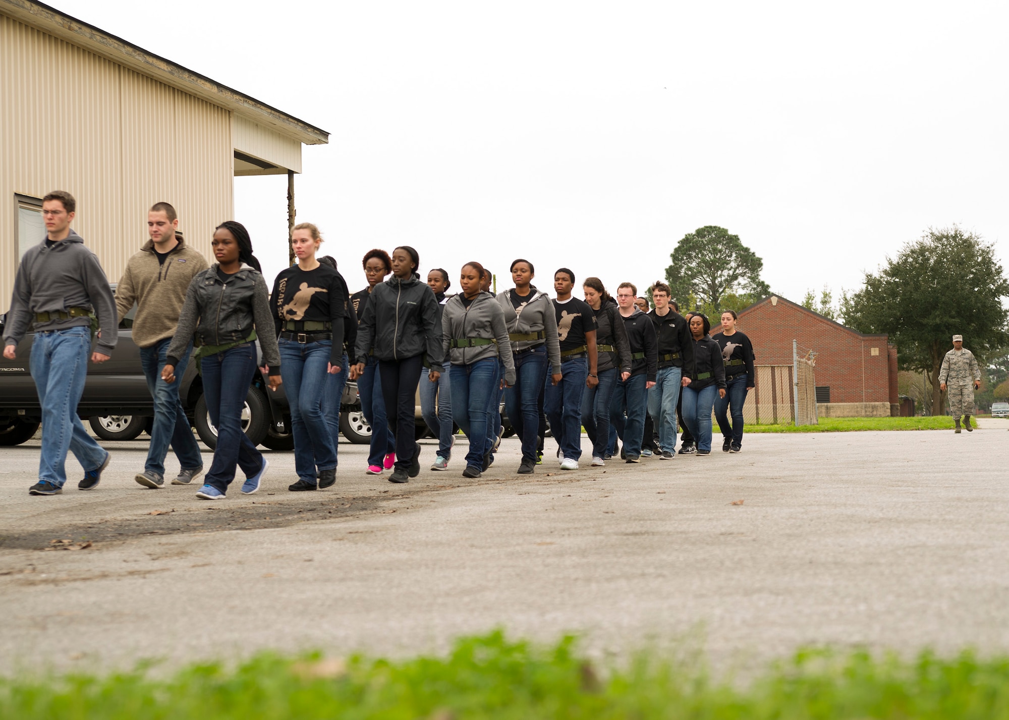 Trainees of the Development and Training Flight march to class January 9, 2016 at Joint Base Charleston. Tech. Sgt. Joshua Melton, the DTF program coordinator for the 315th Airlift Wing, teaches participants the basics of marching and Air Force protocol during their duty day.