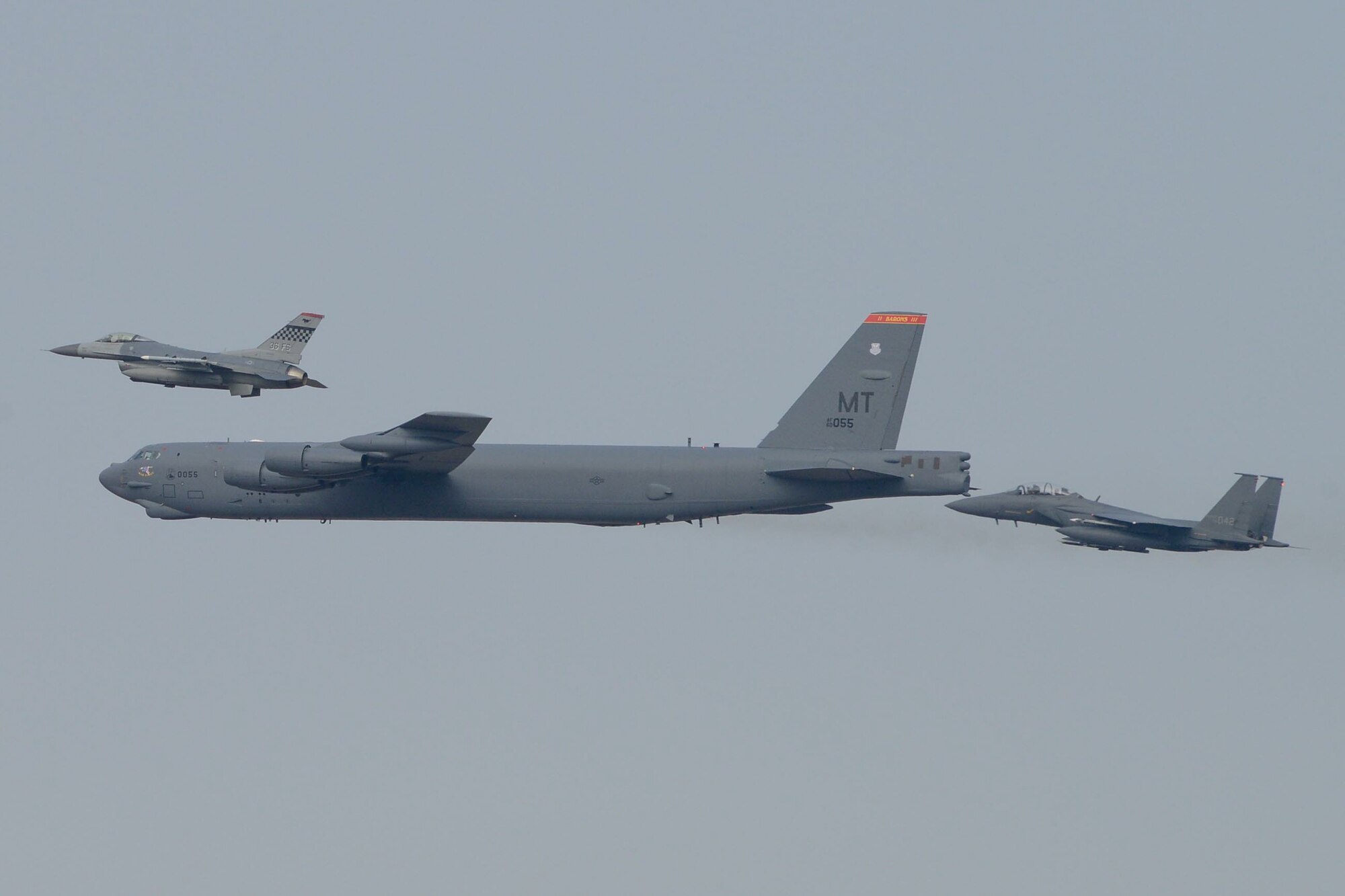 A U.S. Air Force B-52H  Stratofortress from Andersen Air Force Base, Guam, conducted a low-level flight in the vicinity of Osan, South Korea, in response to recent provocative action by North Korea Jan 10, 2016. The B-52 was joined by a ROKAF F-15 Slam Eagle and a U.S. Air Force F-16 Fighting Falcon.  The B-52 is a is a long-range, heavy bomber that can fly up to 50,000 feet and has the capability to carry 70,000 pounds of nuclear or precision guided conventional ordnance with worldwide precision navigation capability. (U.S. Air Force photo/Airman 1st Class Dillian Bamman)