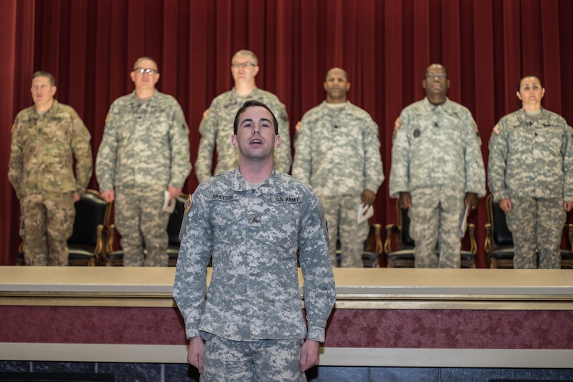 Sgt. Shane Brayton leads Soldiers in reciting the Soldier's Creed during the 304th Special Troops Battalion's Mobilization Ceremony at March Air Reserve Base, Calif., Jan. 10, 2016. The 304th is departing for a one year mission at Fort Bliss, Texas.