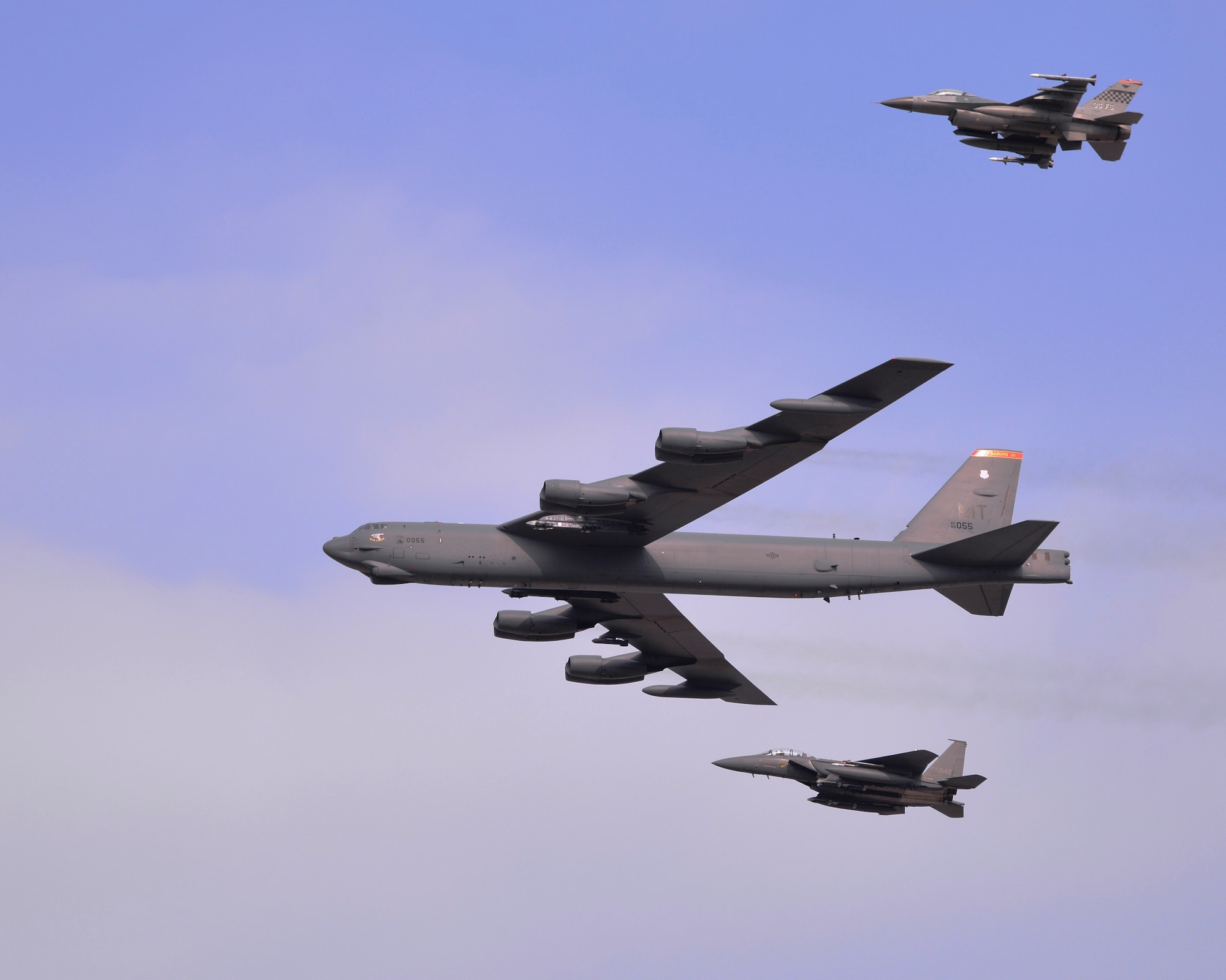 A U.S. Air Force B-52 Stratofortress from Andersen Air Force Base, Guam, conducted a low-level flight in the vicinity of Osan Air Base, South Korea, in response to recent provocative action by North Korea Jan. 10, 2016. The B-52 was joined by a ROKAF F-15K Slam Eagle and a U.S. Air Force F-16 Fighting Falcon. The B-52 is a is a long-range, heavy bomber that can fly up to 50,000 feet and has the capability to carry 70,000 pounds of nuclear or precision guided conventional ordnance with worldwide precision navigation capability. (U.S. Air Force photo/Staff Sgt. Benjamin Sutton)
