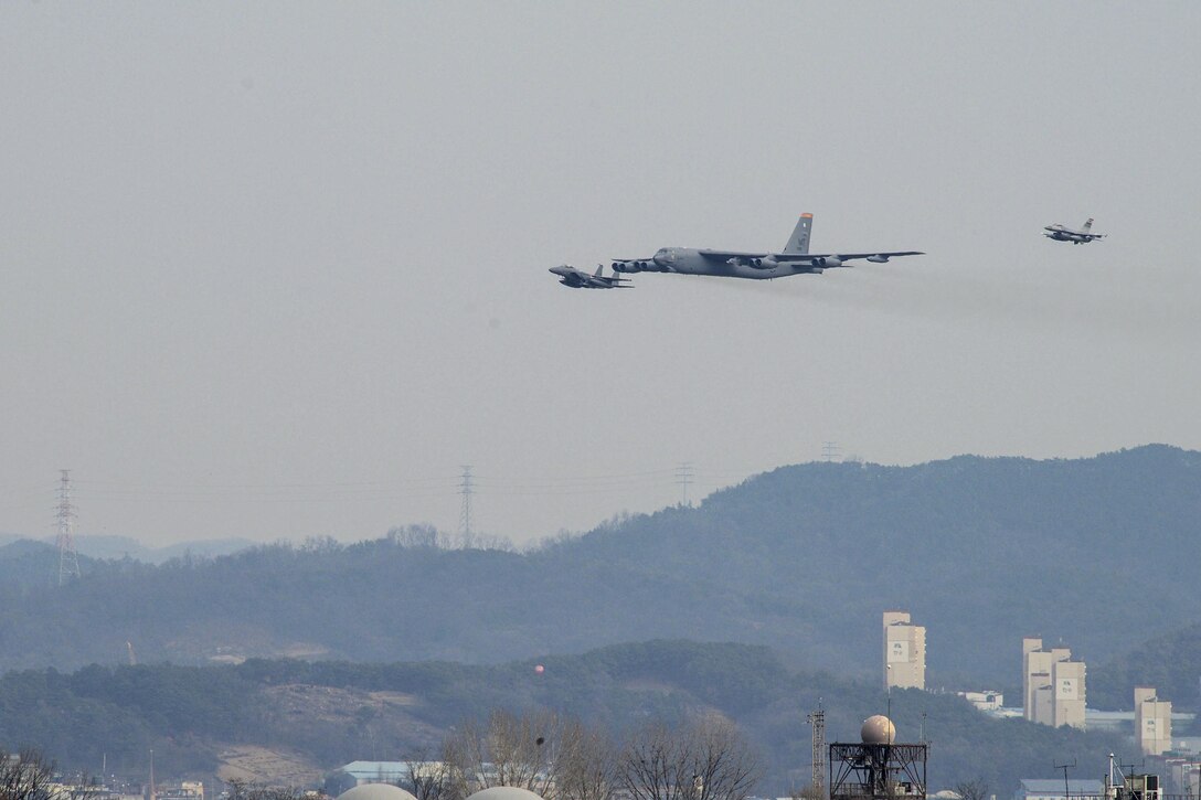 A U.S. Air Force B-52 Stratofortress conducted a low-level flight near Osan Air Base, South Korea, Jan. 10, 2016, in response to recent provocative action by North Korea. A U.S. F-16 Fighting Falcon and a South Korean F-15K jointed the B-52, assigned to Andersen Air Base Guam. U.S. Air Force photo by Airman 1st Class Dillian Bamman