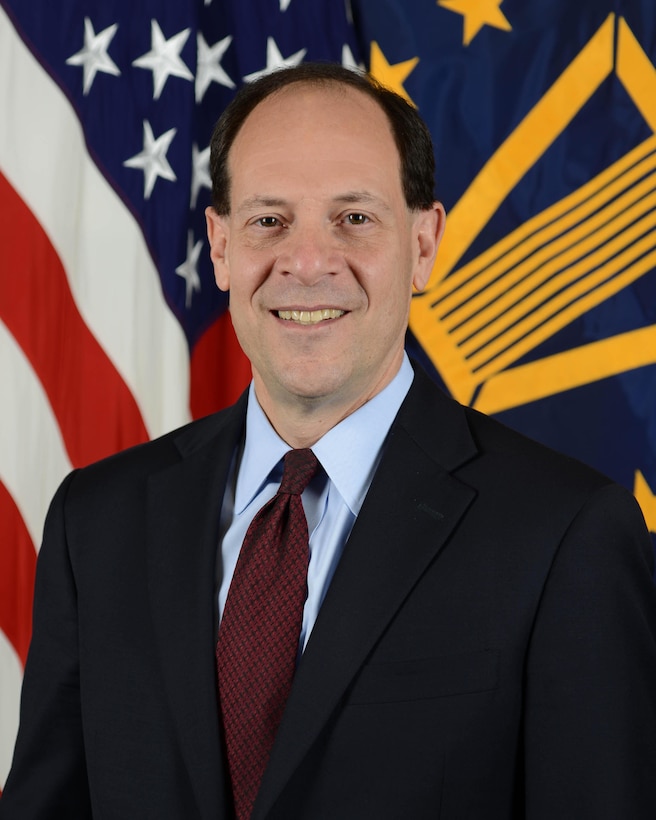 Official photo of Glenn Fine, Acting Inspector General