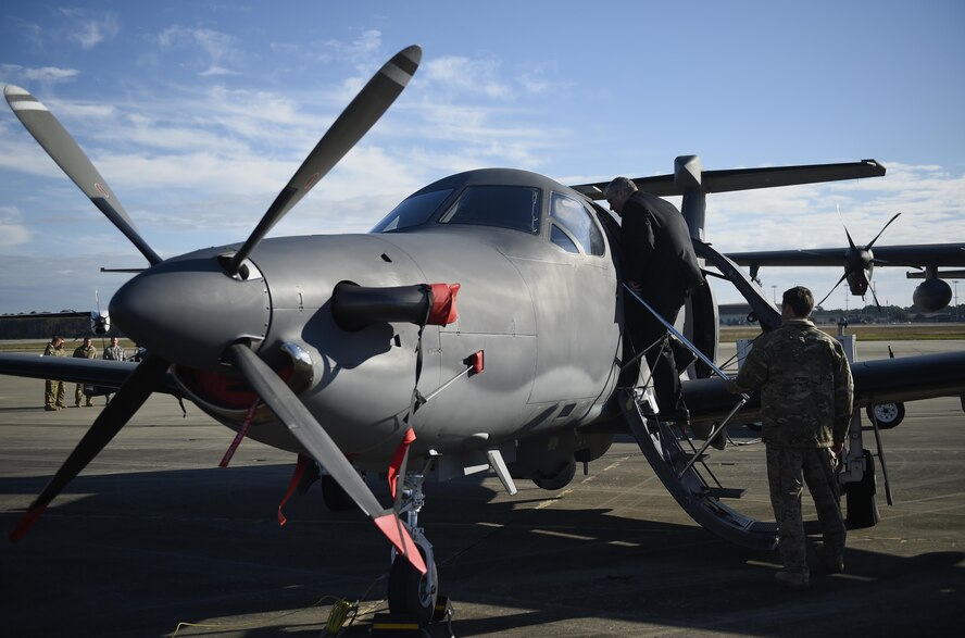 Deputy Secretary of Defense Bob Work tours a U-28A with 1st Special Operations Group Airmen during an Air Force Special Operations Command static aircraft tour at Hurlburt Field, Fla., Jan. 6, 2016. The deputy secretary of defense visited Hurlburt to talk with troops and speak with Air Force Special Operations Command leadership.  (U.S. Air Force photo by Airman 1st Class Kai White)