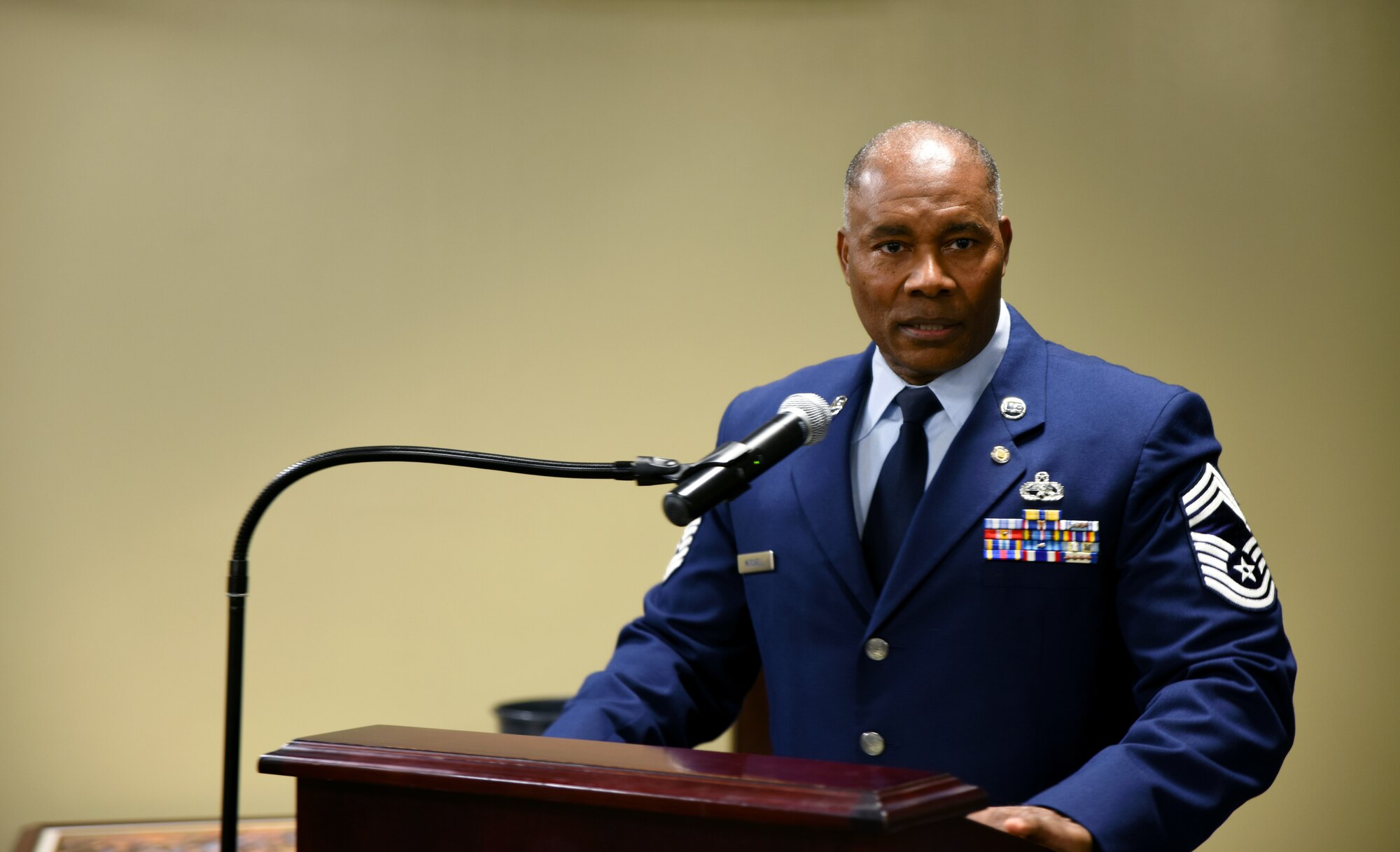 Chief Master Sgt. Kerry Mitchell, 188th Wing human resource advisor, speaks during his retirement ceremony Jan. 10, 2016, during his retirement ceremony at Ebbing Air National Guard Base, Fort Smith, Ark. Mitchell served in the Air National Guard for more than 31 years and previously worked as the first sergeant for the 188th Maintenance Squadron and as the supervisor of the 188th non-destructive inspection shop before becoming the wing HRA. (U.S. Air National Guard photo by Senior Airman Cody Martin/Released)