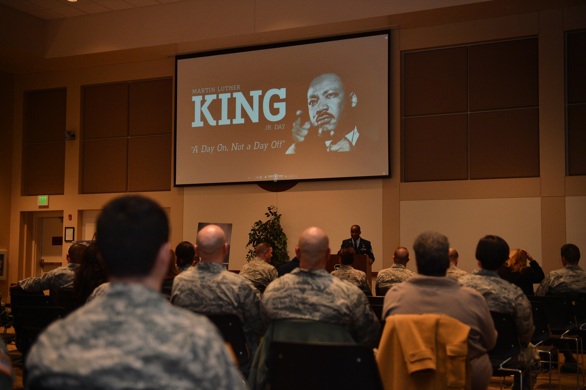 Tech. Sgt. Joel Johnson, Air Reserve Personnel Center education services specialist, speaks during the Martin Luther King, Jr. Day ceremony at the Leadership Development Center Jan. 11, 2016, on Buckley Air Force Base, Colo. The ceremony featured readings of Dr. King’s speeches, videos, and southern style food. (U.S. Air Force photo by Staff Sgt. Darren Scott/Released)