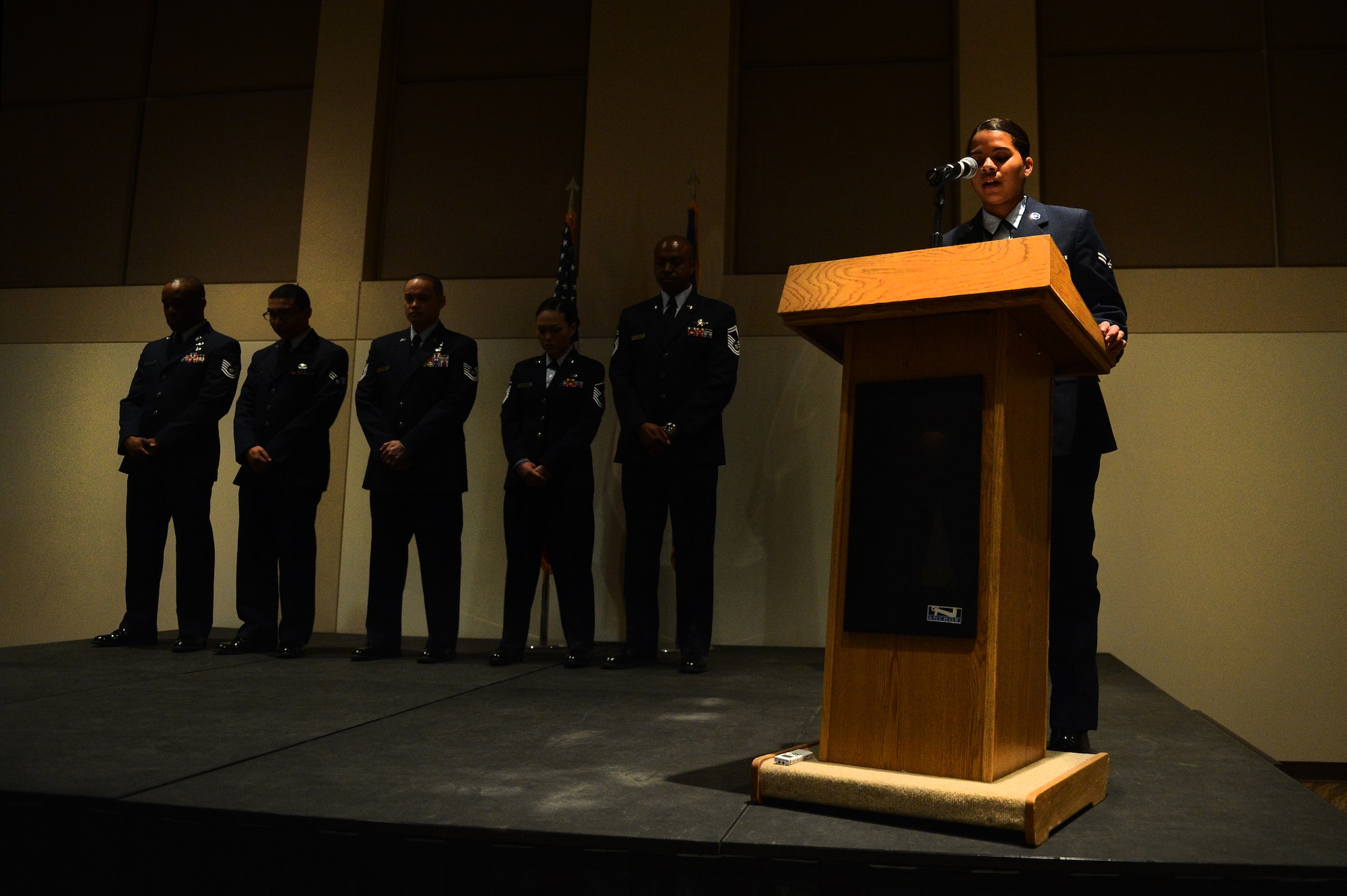 Airman 1st Class Alyssa Duprey, 460th Space Wing Public Affairs broadcast journalist, reads part of a speech by Dr. Martin Luther King, Jr. as part of the Leadership Development Center Jan. 11, 2016, on Buckley Air Force Base, Colo. The ceremony featured readings of Dr. King’s speeches, videos, and southern style food. (U.S. Air Force photo by Staff Sgt. Darren Scott/Released)