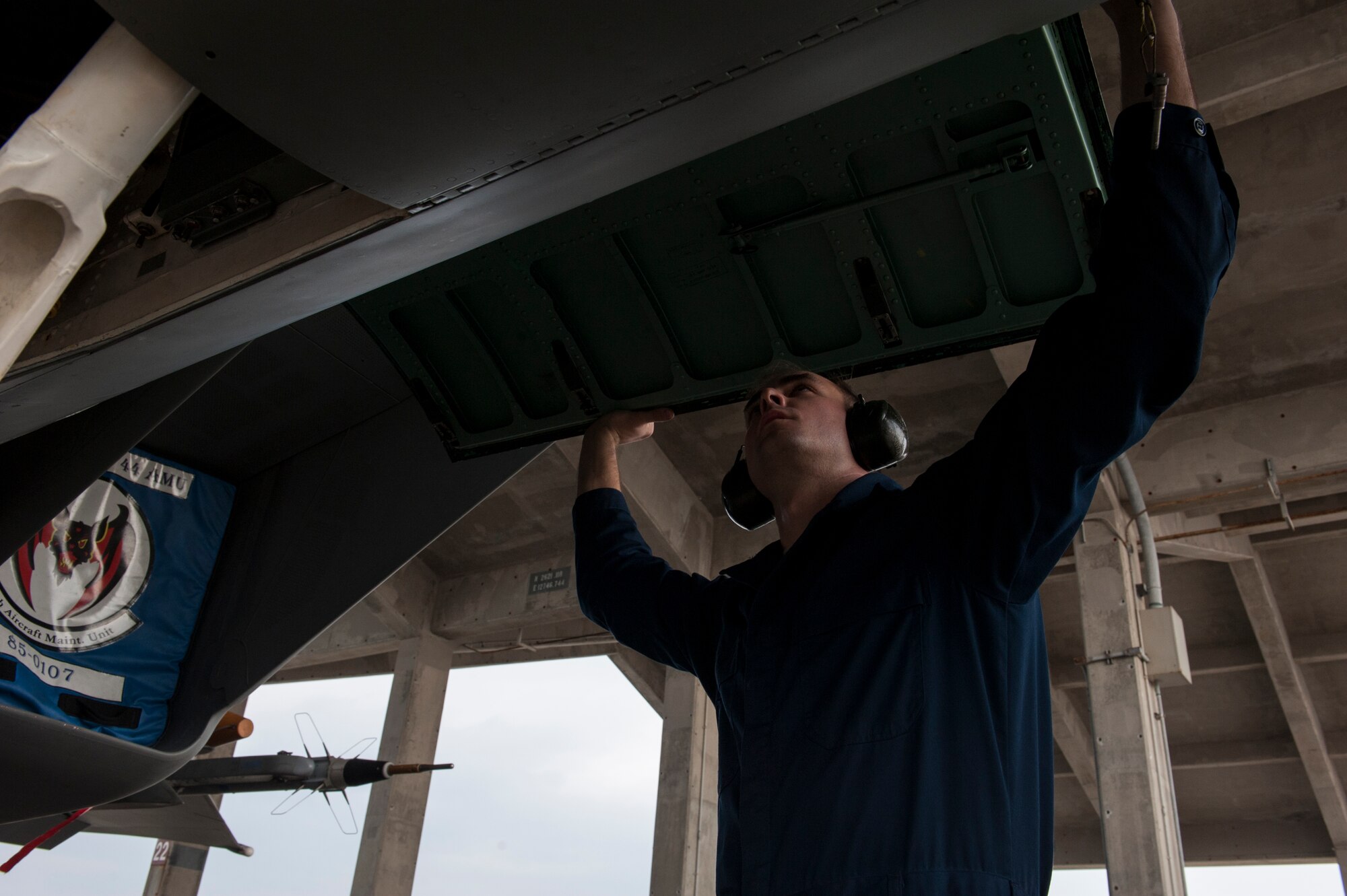 U.S. Air Force Airman 1st Class Joseph Villani, 18th Aircraft Maintenance Squadron, 44th Aircraft Maintenance Unit assisted dedicated crew chief, examines an F-15 Eagle’s circuit breaker system Jan. 8, 2016, at Kadena Air Base, Japan. The slightest short in the system can cause damage to other aircraft components. It is with the work of the maintainers that this can be prevented and premier counter air control can be continued. (U.S. Air Force photo by Airman 1st Class Lynette M. Rolen)